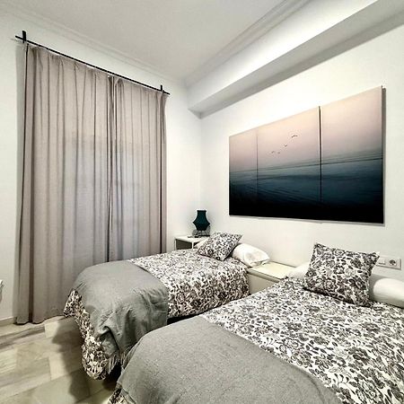 El Reloj Del Viajero 2 Apartment Sevilla Bagian luar foto